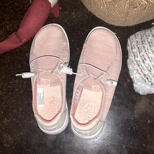 Pink-ish hey dudes,size is a woman 5,they’ve been worn a couple times